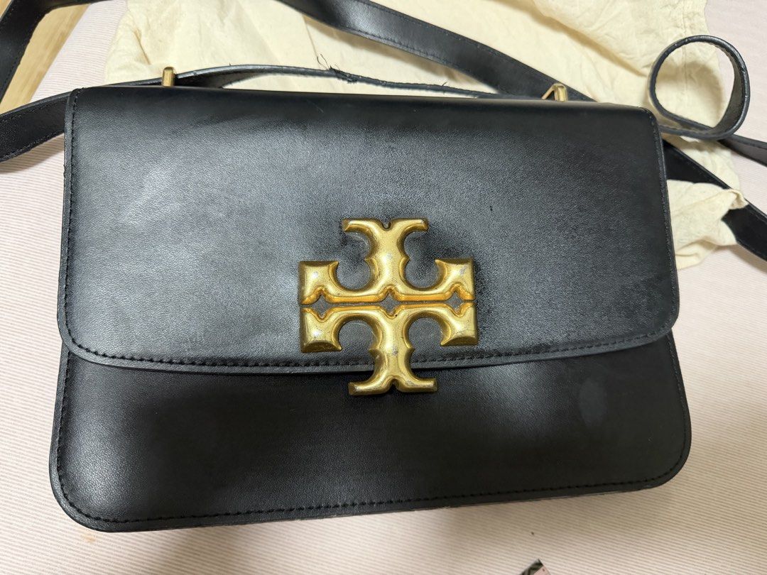 Tory Burch Black Leather Shoulder Bag (Category: Luxury Bags & Wallets) located in Mandaluyong City. Submitted by mkromero (Listing ID 1462156085, Image 2). Description: - Authentic Tory Burch black leather shoulder bag, originally bought for 12k - pangit na yung loob na leather and handle. RFS: too many bags, negotiable price.