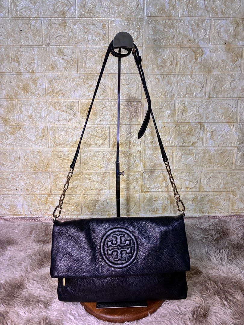 Tory Burch Bombe Foldable Clutch/Crossbody (Category: Clutches) located in Subic. Submitted by anabananaco. (Listing ID 1462209561, Image 1). Description: Guaranteed authentic. Perfect for formal events. Personally owned and well taken care of. .
