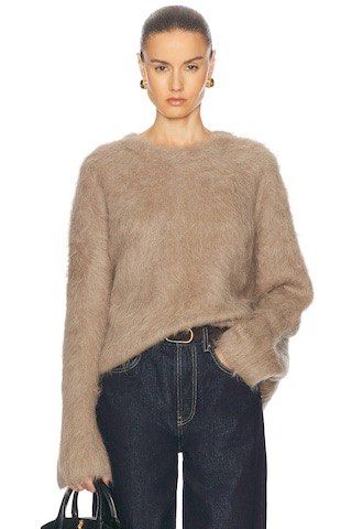 Toteme - Boxy - Alpaca - Knit Sweater (Category: Longsleeves) located in Quezon. Submitted by _sortofgoodsph (Listing ID 1462134682, Image 1). Description: Toteme - Boxy - Alpaca - Knit Sweater Size small on tag Dimensions: Pit to pit - 18.5” Length - 21” Sleeve - 18.5” Shoulder - 21” Hem - 17” - Super soft and fuzzy mohair blend sweater - Versatile for layering or wearing on its own - Pairs well with jeans or skirts Excellent condition No issue 