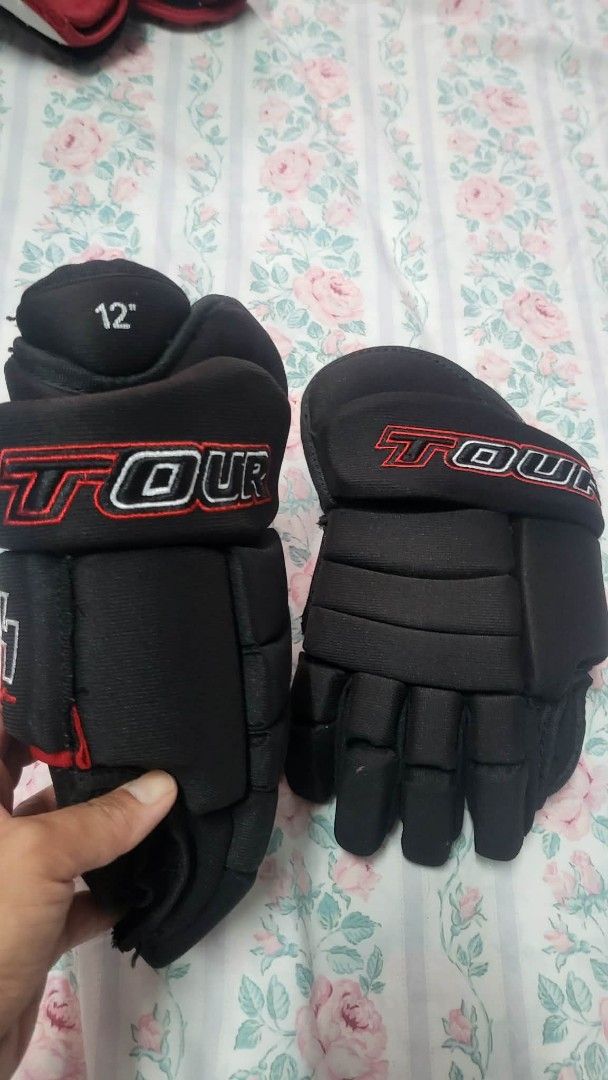 Tour Hockey Gloves 12" (Category: Other Sports Equipment and Supplies) located in Caloocan City. Submitted by sparkplug21 (Listing ID 1462103726, Image 2). Description: - Black Tour hockey gloves - Size: 12 inches - Good for playing hockey - Shows some signs of wear - Still functional and ready for the next game.