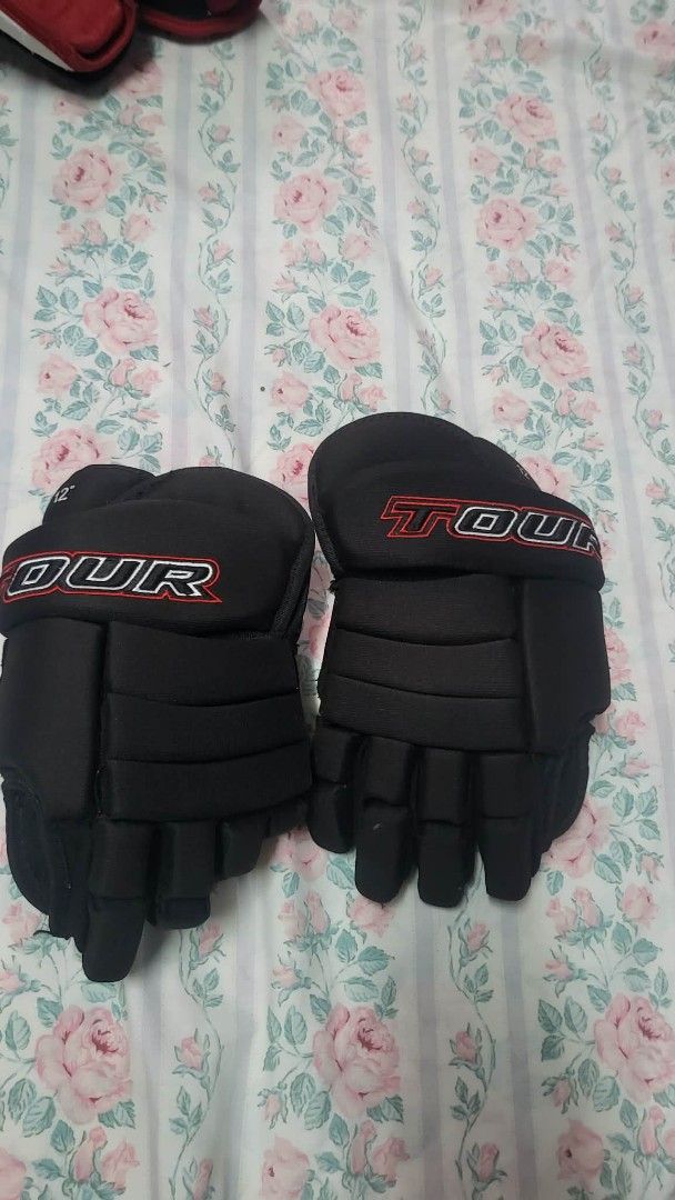 Tour Hockey Gloves 12" (Category: Other Sports Equipment and Supplies) located in Caloocan City. Submitted by sparkplug21 (Listing ID 1462103726, Image 1). Description: - Black Tour hockey gloves - Size: 12 inches - Good for playing hockey - Shows some signs of wear - Still functional and ready for the next game.