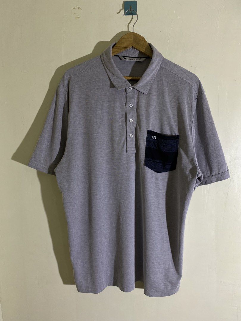 Travis Matthew Golf Polo Shirt (Category: Activewear) located in Calamba. Submitted by zeusthriftfinds (Listing ID 1462187929, Image 1). Description: Travis Matthew Golf Polo Shirt •Size XL Fits XXL (Stretchable) •Width: 24 - 26 •Length: 31 •Like New Condition •Color Rate: 9.8/10 •Issue: None 📍Calamba, Laguna 🏷️ 450 + sf 📩.