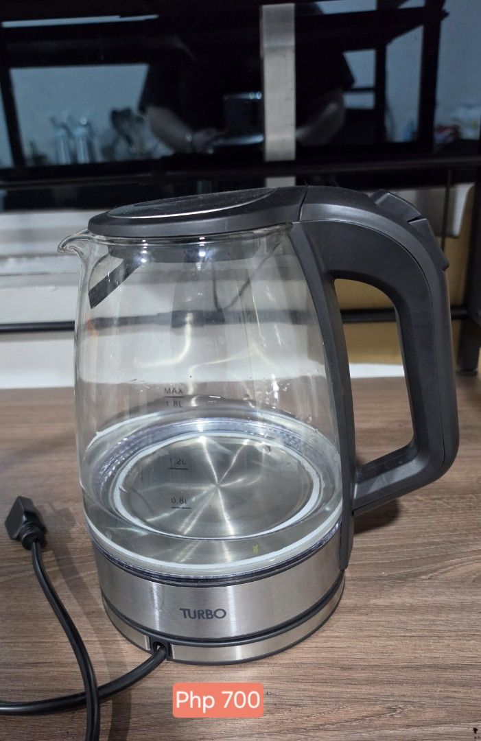 Turbo 1.8L Glass Cordless Kettle (Category: Kettles & Airpots) located in Pasig City. Submitted by beaorselena (Listing ID 1462084976, Image 1). Description: - Brand: Turbo - Capacity: 1.8 Liters - Material: High-quality Glass - Design: Cordless for easy handling and pouring - Feature: See-through body to monitor water level - Ideal for: Coffee, tea, instant meals, and more.