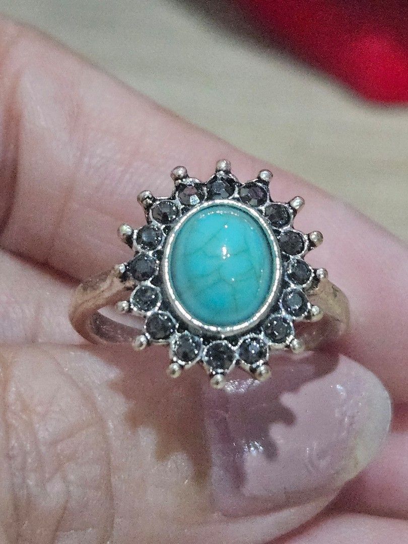Turquoise Stone Flower Style Ring (Category: Rings) located in Cainta. Submitted by Kahi0410 (Listing ID 1462234240, Image 3). Description: Natural Stone Platinum filled setting Dark Gray Zirconian side stone Adjustable ring Hypoallergenic Safe for acidic, sensitive skin.