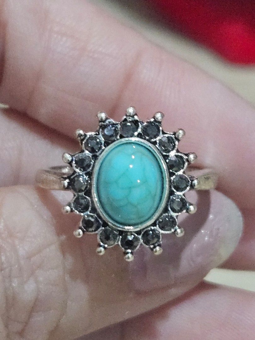 Turquoise Stone Flower Style Ring (Category: Rings) located in Cainta. Submitted by Kahi0410 (Listing ID 1462234240, Image 2). Description: Natural Stone Platinum filled setting Dark Gray Zirconian side stone Adjustable ring Hypoallergenic Safe for acidic, sensitive skin.