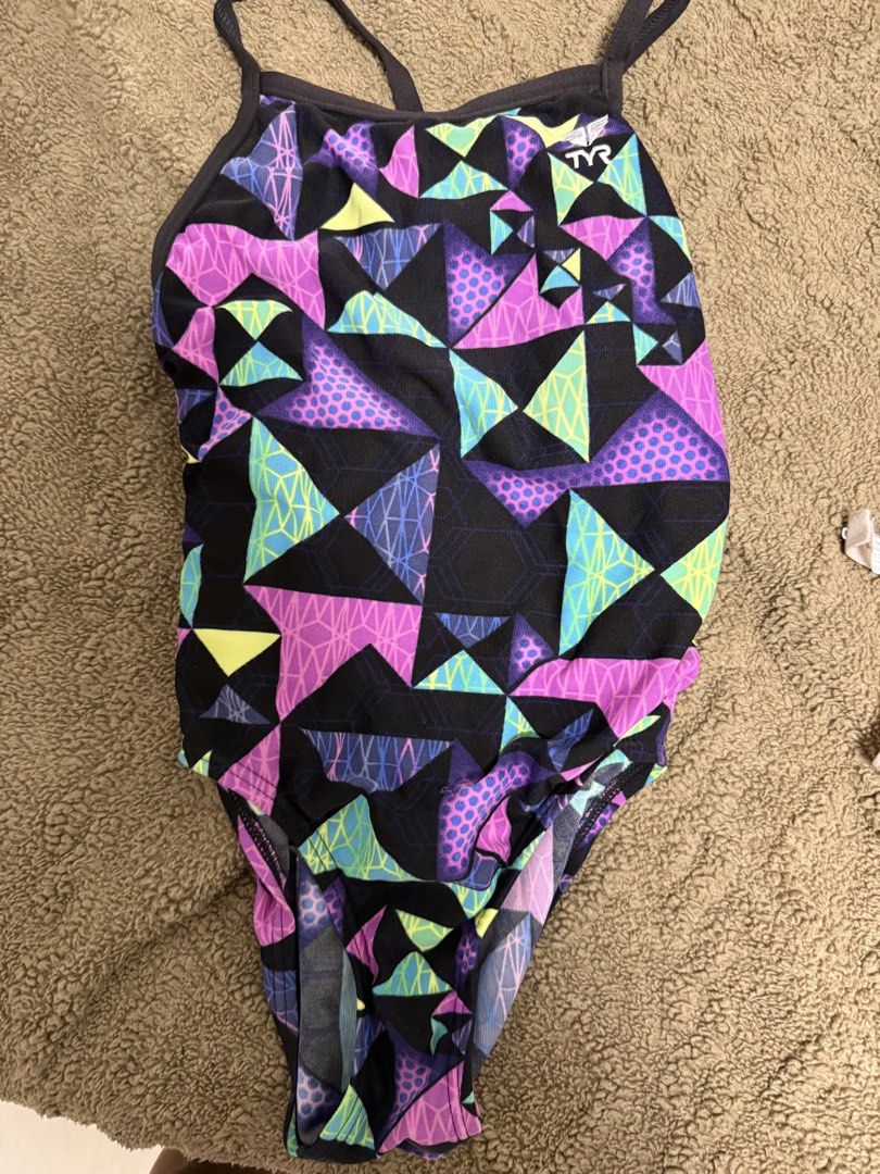 TYR Swimsuit - Geometric Pattern (Category: Bikinis & Swimsuits) located in Cainta. Submitted by marasabu (Listing ID 1462039732, Image 2). Description: TYR swimsuit with a cool geometric pattern. Vibrant colors like purple, pink, and neon green. Great for swimming or training. Comfortable straps and good coverage..