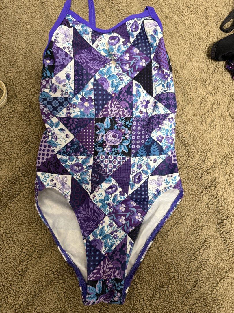TYR Swimsuit - Geometric Pattern (Category: Bikinis & Swimsuits) located in Cainta. Submitted by marasabu (Listing ID 1462039732, Image 3). Description: TYR swimsuit with a cool geometric pattern. Vibrant colors like purple, pink, and neon green. Great for swimming or training. Comfortable straps and good coverage..