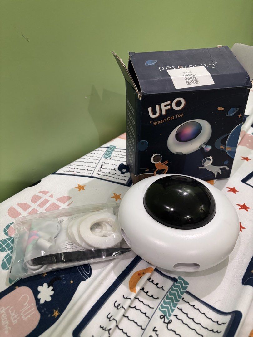 UFO Smart Cat Toy PG-CT021 (Category: Homes & Other Pet Accessories) located in Rizal. Submitted by youronlineshoppe (Listing ID 1462182181, Image 3). Description: - Interactive UFO smart cat toy - Moves autonomously to entertain your cat - Multiple modes and adjustable speeds - USB rechargeable for convenience - Includes feather attachments - Comes with a user guide - Promotes active play and engagement for your feline friend.