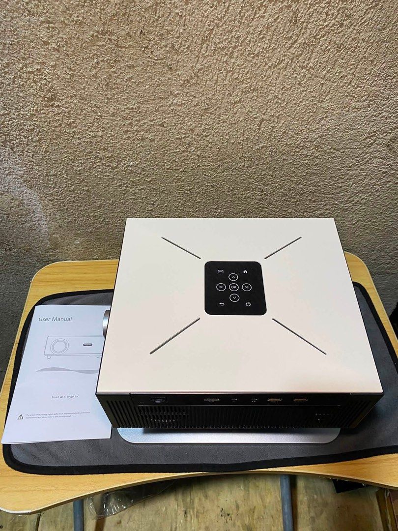 ULTRA 4K Max Resolution Smart Wi-Fi Projector (Category: Projectors) located in Manila. Submitted by grandearth.7ebba2 (Listing ID 1462076770, Image 3). Description: - ULTRA 4K Max Resolution Smart Wi-Fi Projector - Easy Wi-Fi Connectivity - Multiple Ports: HDMI, USB, and more - Ideal for Home Cinema & Presentations - User Manual Included - Get ready for amazing movie nights!.