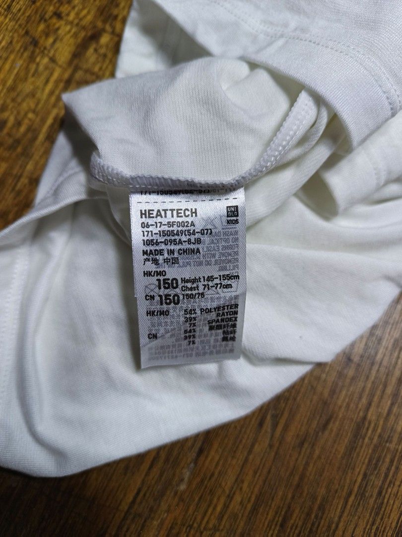 Uniqlo HEATTECH kids size 150 (Category: Babies & Kids Fashion) located in Mandaluyong City. Submitted by heatgear (Listing ID 1462148721, Image 2). Description: - Uniqlo HEATTECH Long-Sleeved Shirt - Color: White - Size: 150 (Recommended height: 145-155cm) chest 71-77cm - Material: Soft and comfortable - Function: Excellent for keeping warm - Origin: Made in China 11-12 years old 280 + sf location mandaluyong.