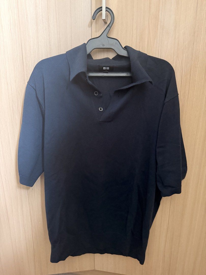 Uniqlo knitted polo (Category: Formal Shirts) located in Quezon City. Submitted by vegasmetii (Listing ID 1462225241, Image 1). Description: Uniqlo knitted polo navy blue (M) on tag 55cm x 60cm Color rate 10/10 .