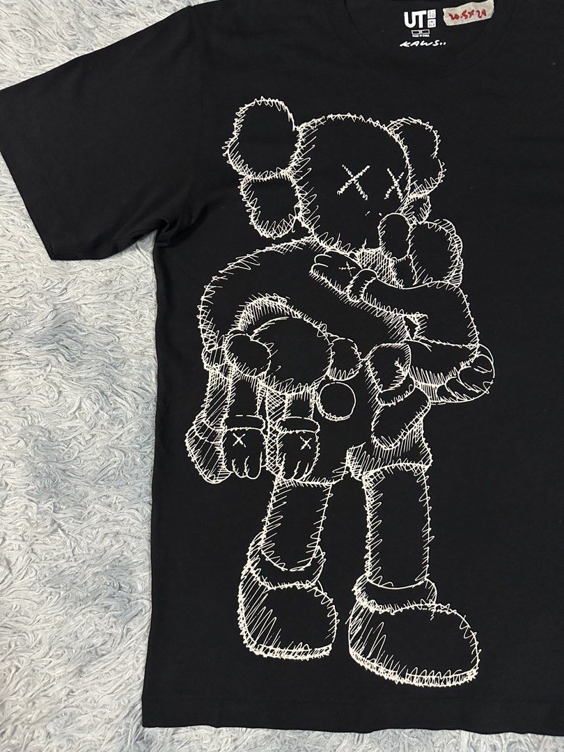 Uniqlo x Kaws Shirt (Category: Tshirts & Polo Shirts ) located in Baao. Submitted by revamped.co (Listing ID 1462144744, Image 2). Description: Uniqlo x Kaws Shirt Excellent Condition Size Medium on Tag 20.5 by 28 Inches No Issue.