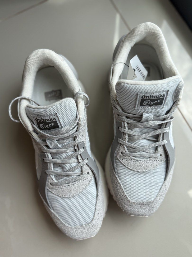 UNISEX Onitsuka Tiger MOAGE CO (Category: Sneakers) located in Quezon City. Submitted by kiseh_opencloset (Listing ID 1462114047, Image 1). Description: - Grey and white Onitsuka Tiger sneakers - Classic design with a modern chunky sole - Ideal for everyday wear - Brand new with original tags attached - Ready for a new home - Unisex - Bought from Taiwan - Size EUR 38/US 5.5 - Website Price ₱16200.