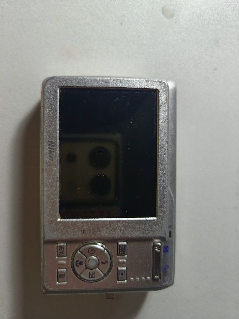 UNTESTED Nikon Coolpix S200 (selling as is) (read desc) (Category: Cameras) located in Quezon City. Submitted by buyfrompochacco (Listing ID 1462200968, Image 2). Description: UNTESTED Nikon Coolpix S200 - Well used - No lens cover - Visible signs of use - Selling mainly for parts - Unit ONLY (no inclusions) - Price nego MOP - Gcash MOD - Lalamove (Sf shouldered by buyer, depends on buyer loc).