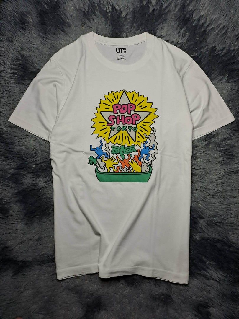 UT Uniqlo x Keith Haring (Category: Tshirts & Polo Shirts ) located in Manila. Submitted by yaseen__73 (Listing ID 1462173223, Image 1). Description: Uniqlo UT short-sleeve graphic T-shirt featuring a colorful "Pop Shop Tokyo" street art design by Keith Haring on the chest Large on Tag Dimensions : See Photo Color Rate : 9.9/10 Flawless In Excellent Condition MOP : G C A S H B A N K T R A N S F E R Courier : J&T 🚛 Lalamove 🛵 Seller's Location :
