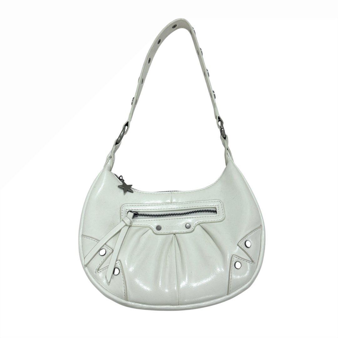 Vanwalk White Patent Leather Shoulder Bag (Category: Shoulder Bags) located in Quezon City. Submitted by nicolerm (Listing ID 1462094778, Image 1). Description: - White patent leather shoulder bag from Vanwalk - Stylish crescent shape - Convenient front zip pocket - Eye-catching stud details on bag and strap - Adjustable strap for comfortable wear - Cute star charm on the zipper pull ★ Used twice only; bought for ₱2,600. Will attempt to wipe off 