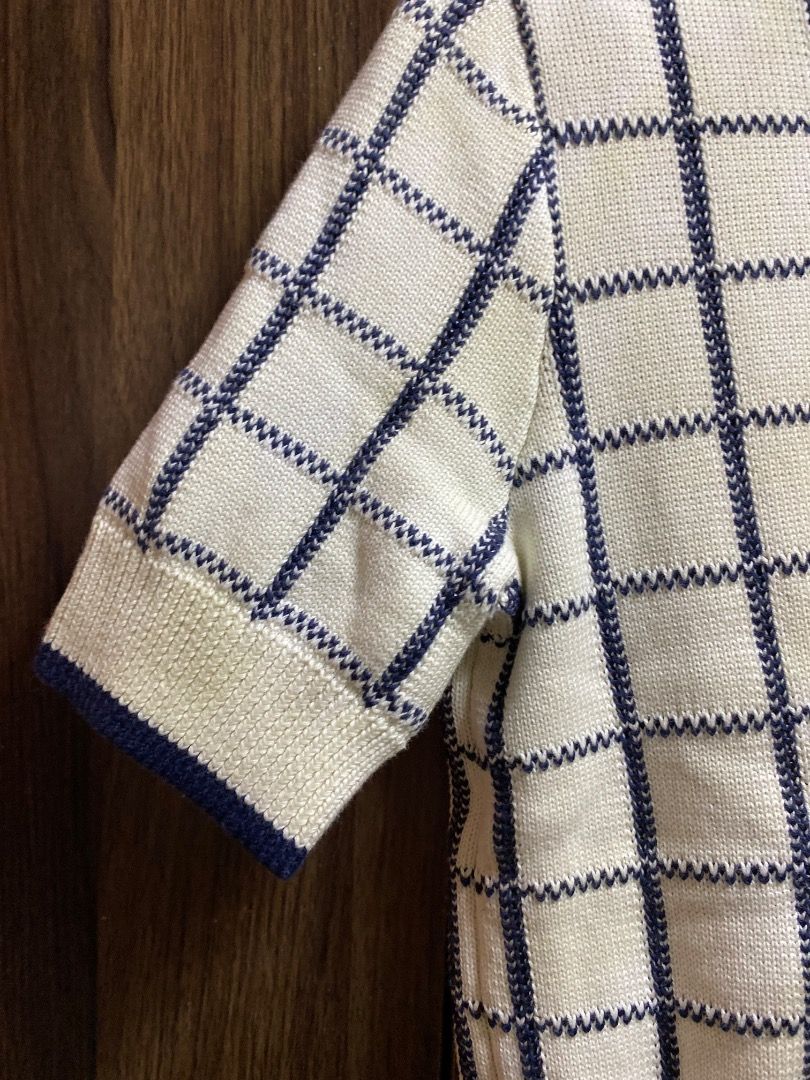 Veronica Beard Windowpane Check Short Sleeve Cotton Sweater (Category: Longsleeves) located in Trece Martires City. Submitted by reloveandrestyle (Listing ID 1462074757, Image 3). Description: -Cut tag ( OG Price: 197 USD) - Veronica Beard short sleeve sweater - Color: Cream with navy windowpane check pattern - Features: Crew neck with navy trim, short sleeves with navy cuffs - Material: 100% Cotton - Versatile: Great for layering or wearing on i