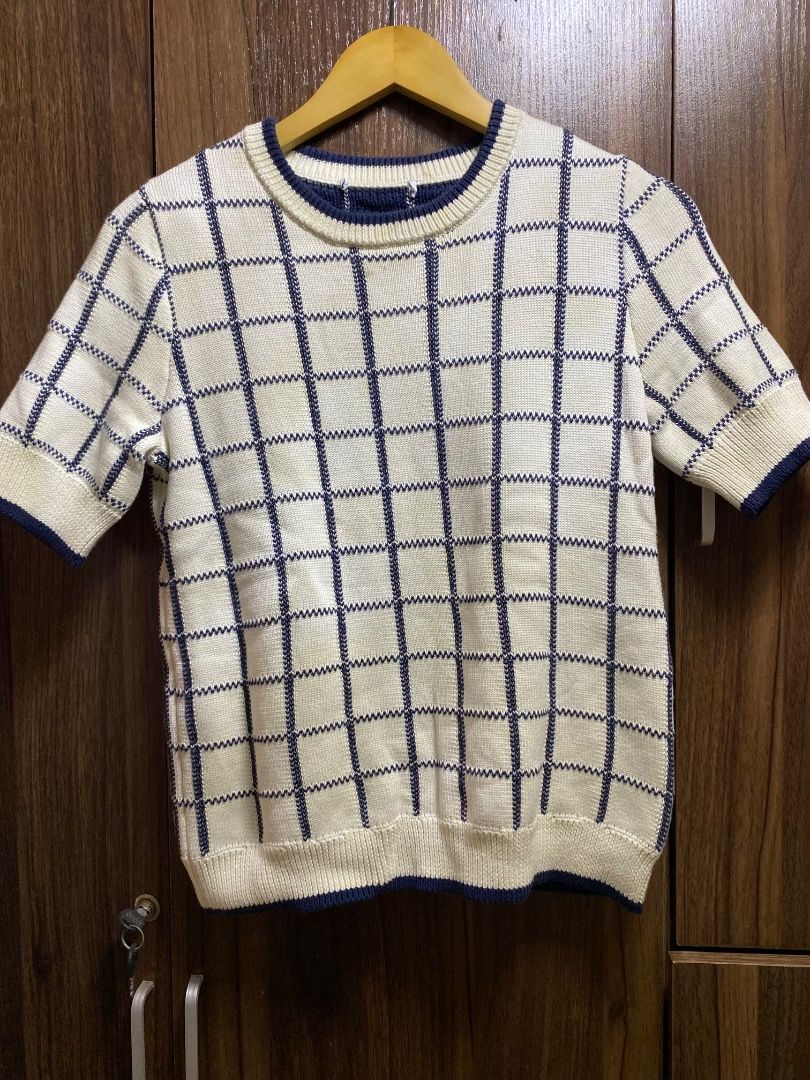 Veronica Beard Windowpane Check Short Sleeve Cotton Sweater (Category: Longsleeves) located in Trece Martires City. Submitted by reloveandrestyle (Listing ID 1462074757, Image 2). Description: -Cut tag ( OG Price: 197 USD) - Veronica Beard short sleeve sweater - Color: Cream with navy windowpane check pattern - Features: Crew neck with navy trim, short sleeves with navy cuffs - Material: 100% Cotton - Versatile: Great for layering or wearing on i