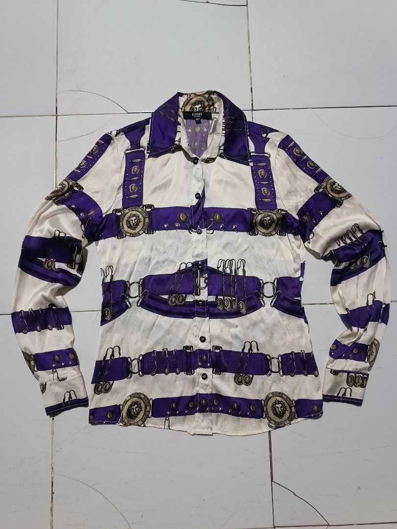 Versus Versace Silk Print Button-Up Shirt (Category: Luxury Apparel) located in Barotac Nuevo. Submitted by gray101 (Listing ID 1462166198, Image 3). Description: - Brand: Versus Versace - Material: 100% Silk - Design: Bold purple and white belt print with iconic Medusa head motif - Style: Long sleeves, button-up front - Origin: Made in Italy - Size: 36 - Condition: Great statement piece.