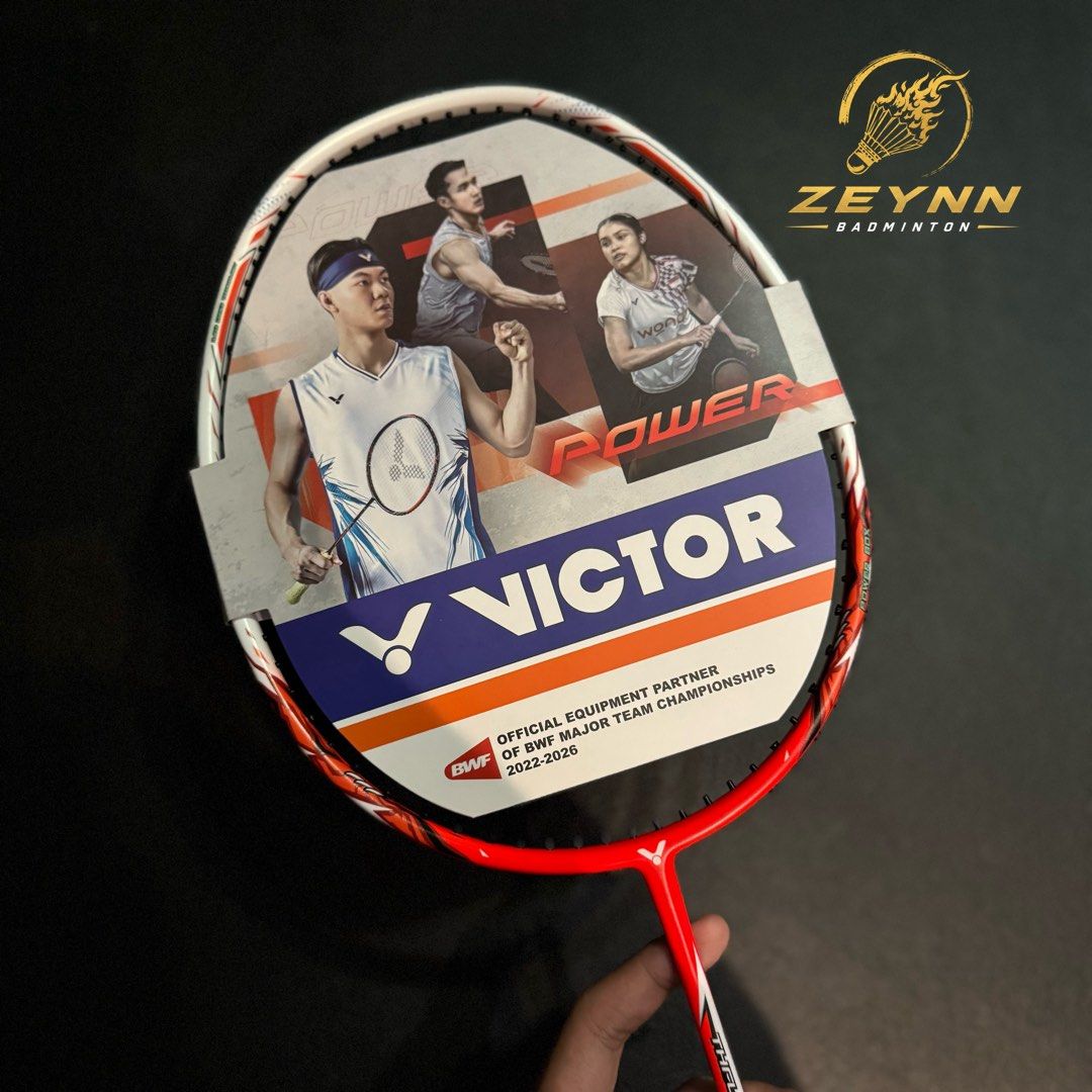 Victor Thruster Ryuga TD D ( Flame Red ) - Authentic / Original (Category: Racket and Ball Sports) located in Las Pinas. Submitted by lvespinaa (Listing ID 1462170391, Image 2). Description: ‼️AVAILABLE ONHAND : VICTOR THRUSTER RYUGA TD D‼️ Featuring a powerful setup for intermediate players, designed for those looking to add more power and confidence to their attacking game!💥 Solid feel, easy handling, and ready for strong smashes and aggressiv