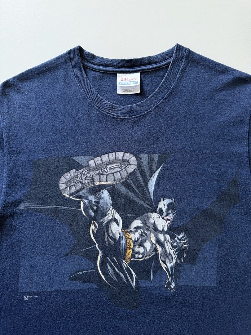 Vintage 2000s DC Comics Batman tee shirt (Category: Tshirts & Polo Shirts ) located in Santa Rosa. Submitted by arvintage.ph (Listing ID 1462177567, Image 3). Description: Details: Vintage 2000s graphitti design. Small on hanes heavyweight tag. Measurements of 18.5” x 30” Issue: Tiny tear at the underarm seam.