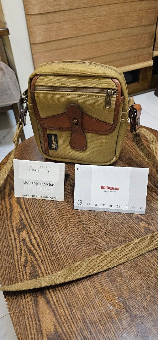 Vintage Billingham Pola Stowaway (Category: Luxury Bags & Wallets) located in Navotas City. Submitted by walburst (Listing ID 1462111392, Image 1). Description: Vintage Billingham Pola Stowaway series Made in England Prod Year: 1998 OPTI zippers Brass hardwares (complete and working) Guarantee card/paper In good condition considering its age. *minor leather piping cracks.