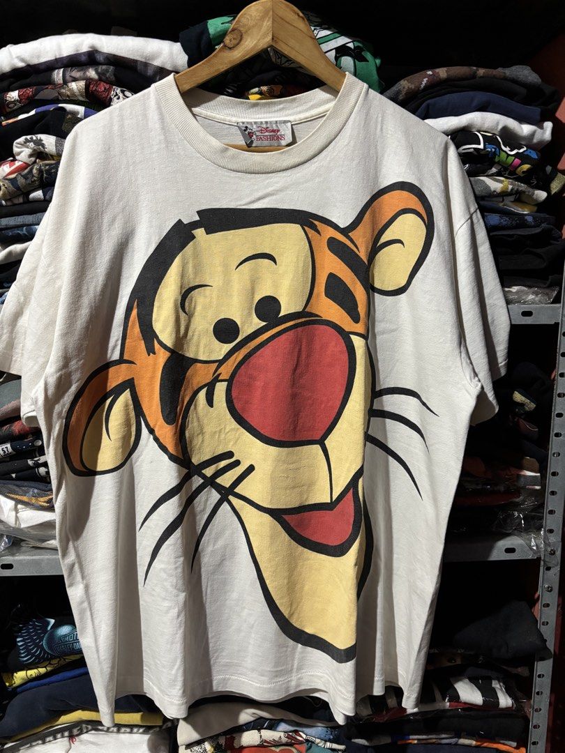 Vintage Disney Tigger Big Face (Category: Tshirts & Polo Shirts ) located in Lucena. Submitted by __betterbargains (Listing ID 1462087105, Image 1). Description: Vintage Disney Tigger Big Face XL (23 x 28.5) Slice but has patch inside (check photos) ₱5,000 + SF.