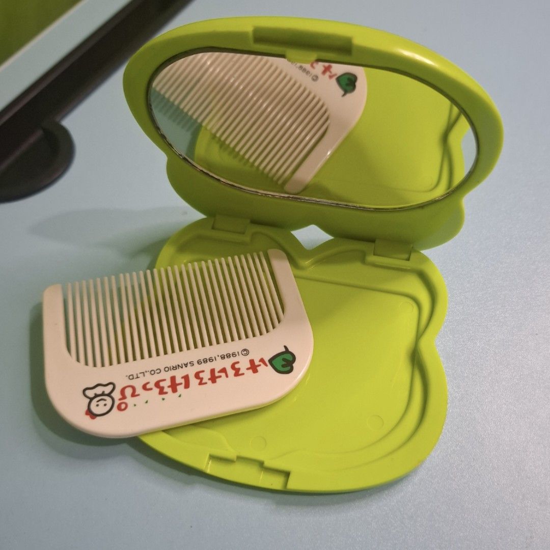 Vintage Keroppi compact mirror with comb (Category: Other Stationery & Craft) located in Adams. Submitted by frog_and_clover (Listing ID 1462244935, Image 2). Description: favorite collection of all my keroppi collectibles. well used but not abused, no damage still functioning. message for me for more picture.