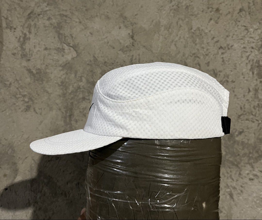 Vintage Nike Tailwind Dri-Fit Hat Cap White 5-Panel Adjustable (Category: Caps & Hats) located in General Santos City (Dadiangas). Submitted by thiftnibadi3 (Listing ID 1462167229, Image 2). Description: - White Nike Cap - Dri-FIT material for sweat-wicking - Adjustable strap for a custom fit - Classic Nike Swoosh logo - Made in Taiwan.