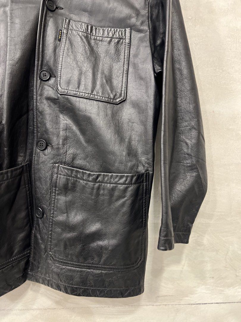 Vintage Paul Smith Leather Jacket (Category: Coats, Jackets and Outerwear) located in Quezon City. Submitted by shanks. (Listing ID 1462100017, Image 3). Description: This classic vintage black leather chore jacket from Paul Smith blends timeless utilitarian styling with the brand’s signature refined craftsmanship. Lined with a contrasting tan interior shell displaying the vintage Paul Smith London woven label. Size : 15/16 Dimensions: Length: 29