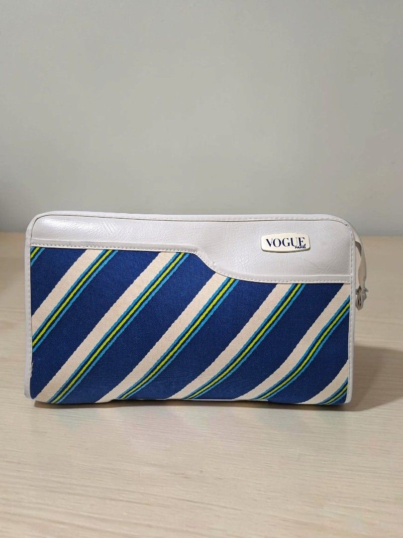VOGUE PARIS LEATHER CLUTCH PURSE (Category: Clutches) located in Las Pinas. Submitted by annachiaonair2037 (Listing ID 1462184520, Image 1). Description: VOGUE PARIS LEATHER CLUTCH PURSE FROM JAPAN YKK ZIP INNER LEATHER LINING EXTERIOR LEATHER WITH CANVAS H 6.5" L 8.5" Disclaimer: I am not affiliated with, associated with, or authorized by any of the brands featured posted. Any mention of brand names, trademarks, or logos is solely for identifica