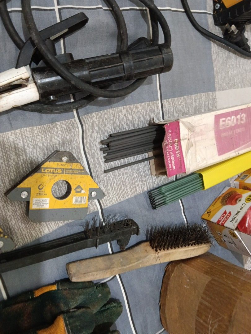 Welding Machine, Grinder, Gloves, Electrodes & Accessories (Category: Construction Tools & Equipment) located in Quezon City. Submitted by wads_ (Listing ID 1462054538, Image 3). Description: - KABAWAL Welding Machine set 200A - Lotus Grinder 900W with paddle switch -Stanley Grinder 900W - Welding Gloves - E6013 Welding Electrodes - Magnetic Welding Holders - 2 Wire Brush - Grinding Discs -Auto-darkening welding goggles - Some items still in orig