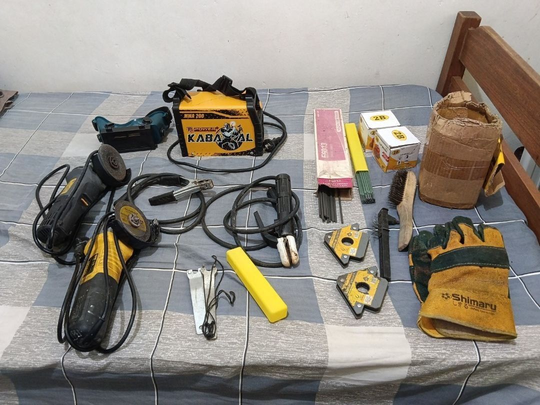 Welding Machine, Grinder, Gloves, Electrodes & Accessories (Category: Construction Tools & Equipment) located in Quezon City. Submitted by wads_ (Listing ID 1462054538, Image 1). Description: - KABAWAL Welding Machine set 200A - Lotus Grinder 900W with paddle switch -Stanley Grinder 900W - Welding Gloves - E6013 Welding Electrodes - Magnetic Welding Holders - 2 Wire Brush - Grinding Discs -Auto-darkening welding goggles - Some items still in orig