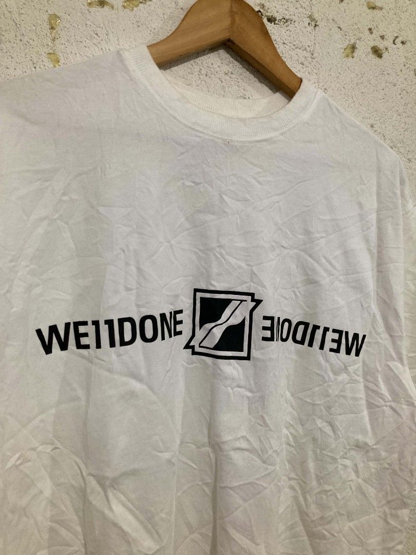 WELLDONE Mirror Logo Tee (Category: Tshirts & Polo Shirts ) located in San Jose del Monte. Submitted by zen31 (Listing ID 1462239976, Image 3). Description: WE11DONE TEE 21X26.5 DIMENSION VERY GOOD CONDITION 9.5/10 COLOR RATE ISSUE: NO NECK & STAINS (NEED WASH).