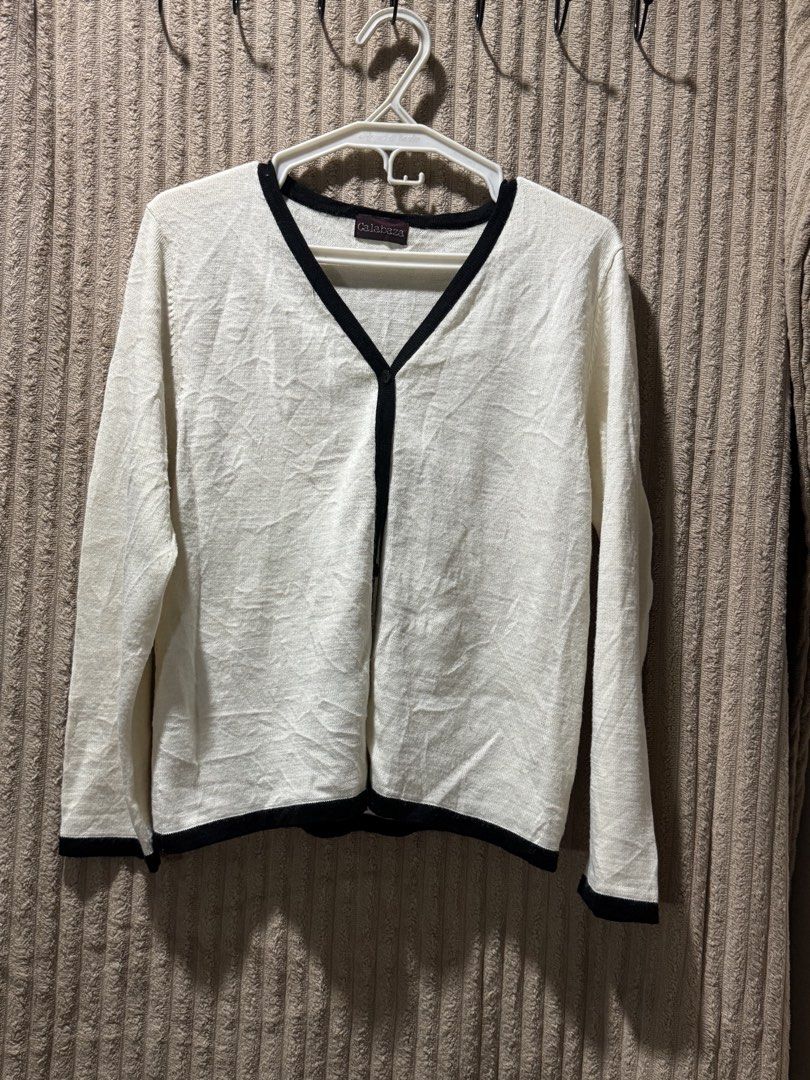 White & Black Trim Cardigan (Category: Undergarments & Loungewear) located in Pasay City. Submitted by christinetek (Listing ID 1462118107, Image 1). Description: - Classic white cardigan - Black trim detail - Lightweight knit material.