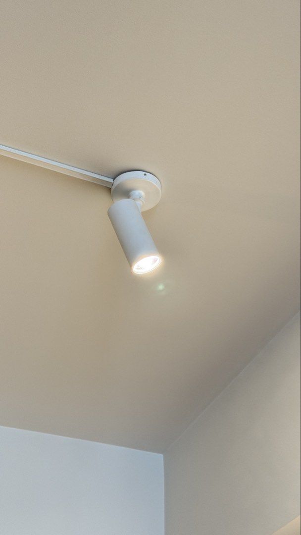 White Track Lighting Set with 4 Spotlights (Category: Lighting) located in Makati City. Submitted by maiemacale (Listing ID 1462161322, Image 2). Description: - Set of 3+1 track lighting system - Includes track and 4 adjustable spotlights - Condition: Like New Original Price: Php11,650 Selling Price: Php8,000.