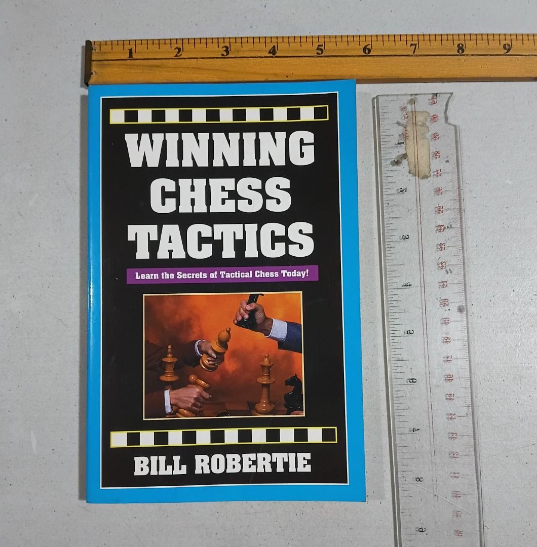 Winning Chess Tactics by Bill Robertie (Paperback) (Category: Storybooks) located in Marikina City. Submitted by my-an (Listing ID 1462193030, Image 1). Description: Perfect for beginner to intermediate chess players looking to improve their tactical game. Written by chess master Bill Robertie and published by Cardoza Publishing. It features easy-to-read diagrams covering essential tactics like pins, forks, skewers, discovered checks, and double 
