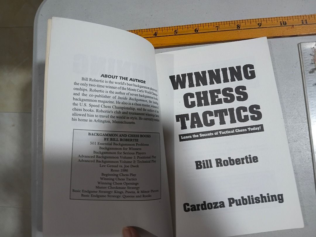 Winning Chess Tactics by Bill Robertie (Paperback) (Category: Storybooks) located in Marikina City. Submitted by my-an (Listing ID 1462193030, Image 2). Description: Perfect for beginner to intermediate chess players looking to improve their tactical game. Written by chess master Bill Robertie and published by Cardoza Publishing. It features easy-to-read diagrams covering essential tactics like pins, forks, skewers, discovered checks, and double 