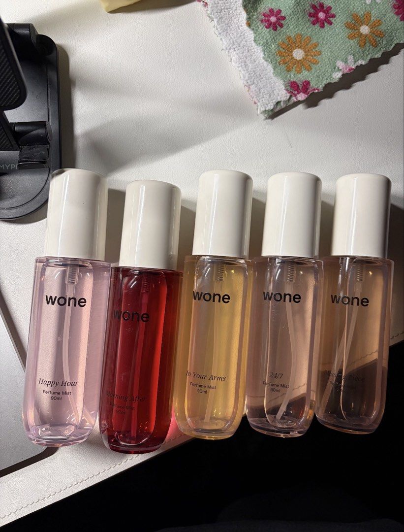 Wone Perfume Mist (Category: Fragrance & Deodorants) located in Dasmarinas. Submitted by authenticlady (Listing ID 1462075101, Image 1). Description: - Each bottle is 90ml - Available scents: Happy Hour, Morning After, In Your Arms, 24/7, Missing Piece - All bottles are 97-100% full Php 350 each or Php 1750 take all.