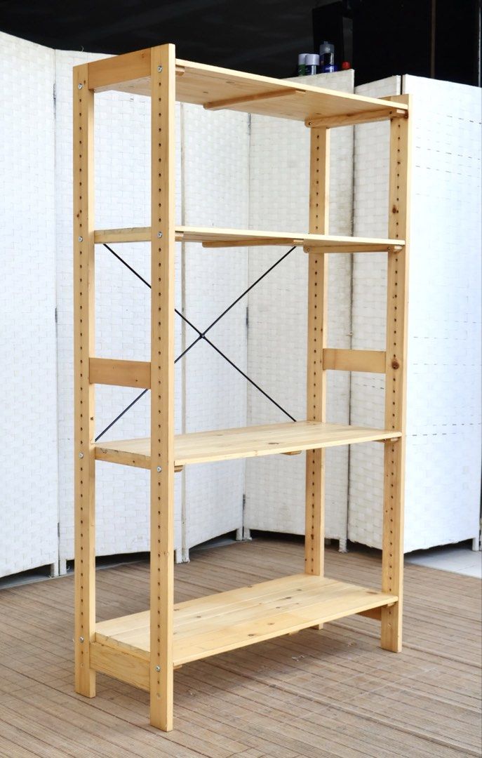 Wooden 4-Tier Shelf Storage Rack (Category: Shelves, Cabinets & Racks) located in Bulacan. Submitted by FurnitureGallery (Listing ID 1462257514, Image 3). Description: - Light wood 4-tier shelving unit - Adjustable shelves for flexible storage - Sturdy design with rear cross-bracing for stability - Simple assembly process - Approximately [insert height] tall - Ideal for organizing books, plants, and display items in any room JAPAN SURPLUS FURNITU