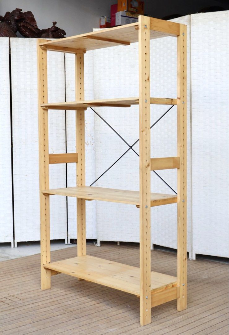 Wooden 4-Tier Shelf Storage Rack (Category: Shelves, Cabinets & Racks) located in Bulacan. Submitted by FurnitureGallery (Listing ID 1462257514, Image 2). Description: - Light wood 4-tier shelving unit - Adjustable shelves for flexible storage - Sturdy design with rear cross-bracing for stability - Simple assembly process - Approximately [insert height] tall - Ideal for organizing books, plants, and display items in any room JAPAN SURPLUS FURNITU