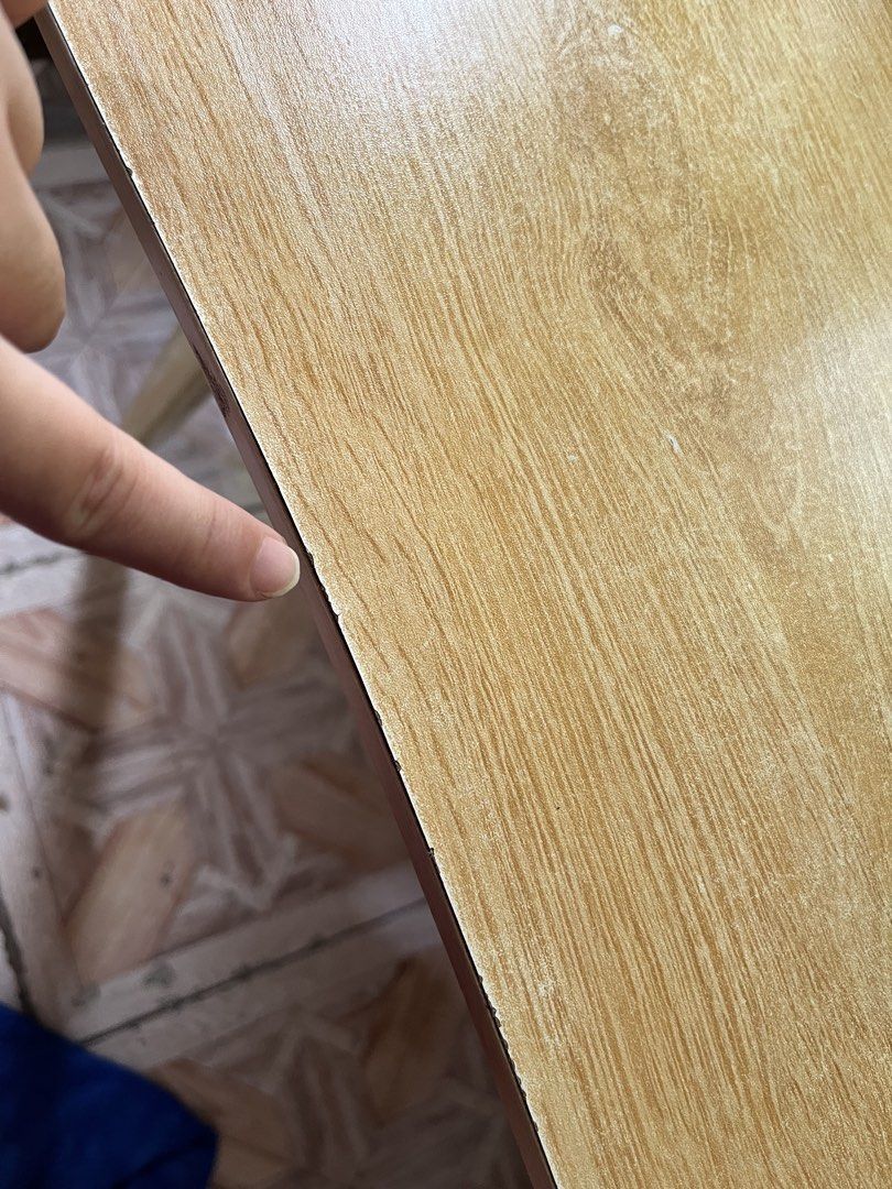 Wooden Side Table with Tapered Legs (Category: Tables & Sets) located in Angono. Submitted by regineraymundo (Listing ID 1462078621, Image 2). Description: Simple wooden side table. Light wood finish with rounded corners. Four tapered legs provide stability. Small nicks and wear along the edges, as shown in photos. Great for a small space or as an accent piece. Easy to move around..