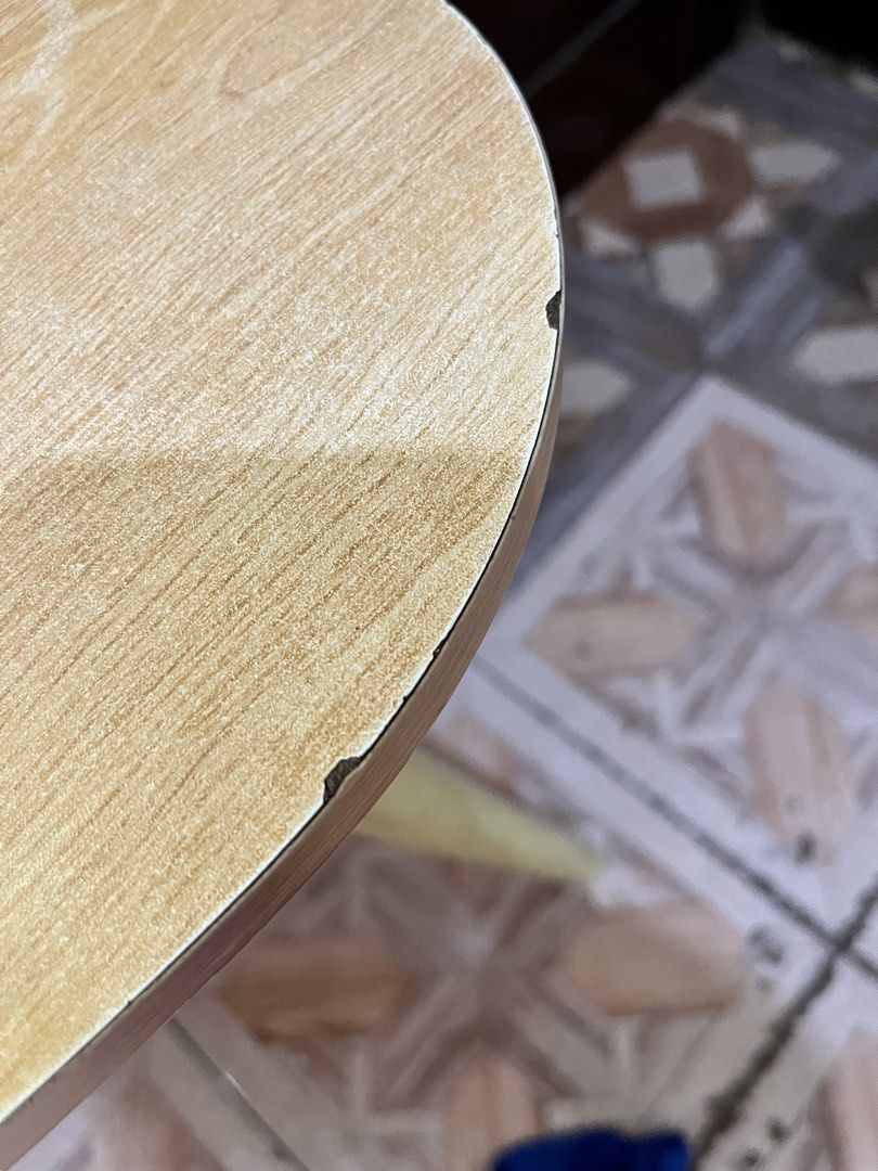 Wooden Side Table with Tapered Legs (Category: Tables & Sets) located in Angono. Submitted by regineraymundo (Listing ID 1462078621, Image 3). Description: Simple wooden side table. Light wood finish with rounded corners. Four tapered legs provide stability. Small nicks and wear along the edges, as shown in photos. Great for a small space or as an accent piece. Easy to move around..