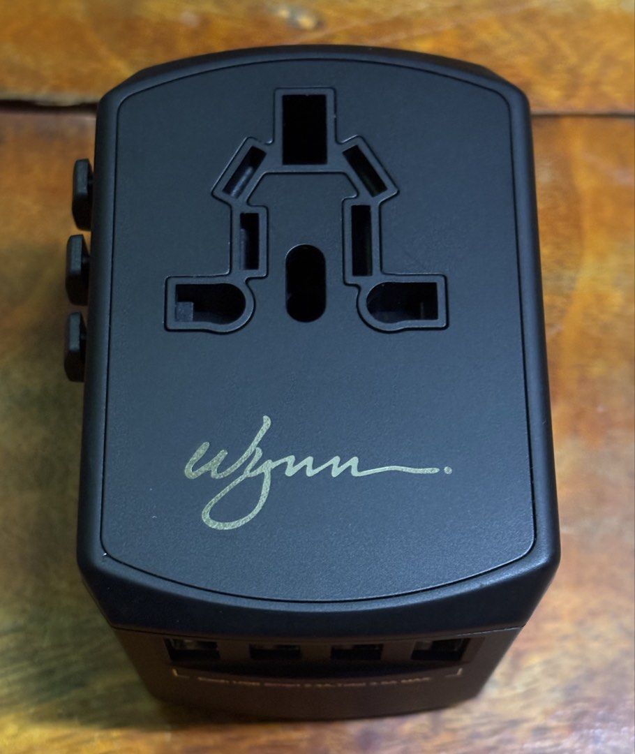 WYNN universal travel adapter (Category: Chargers & Cables) located in Santo Domingo. Submitted by royal.teresa (Listing ID 1462176564, Image 2). Description: -reliable compact all in one international travel adapter -works in over 150+countries -4 smart USB ports -single block covers all your charging needs without needing to carry a separate wall plugs.