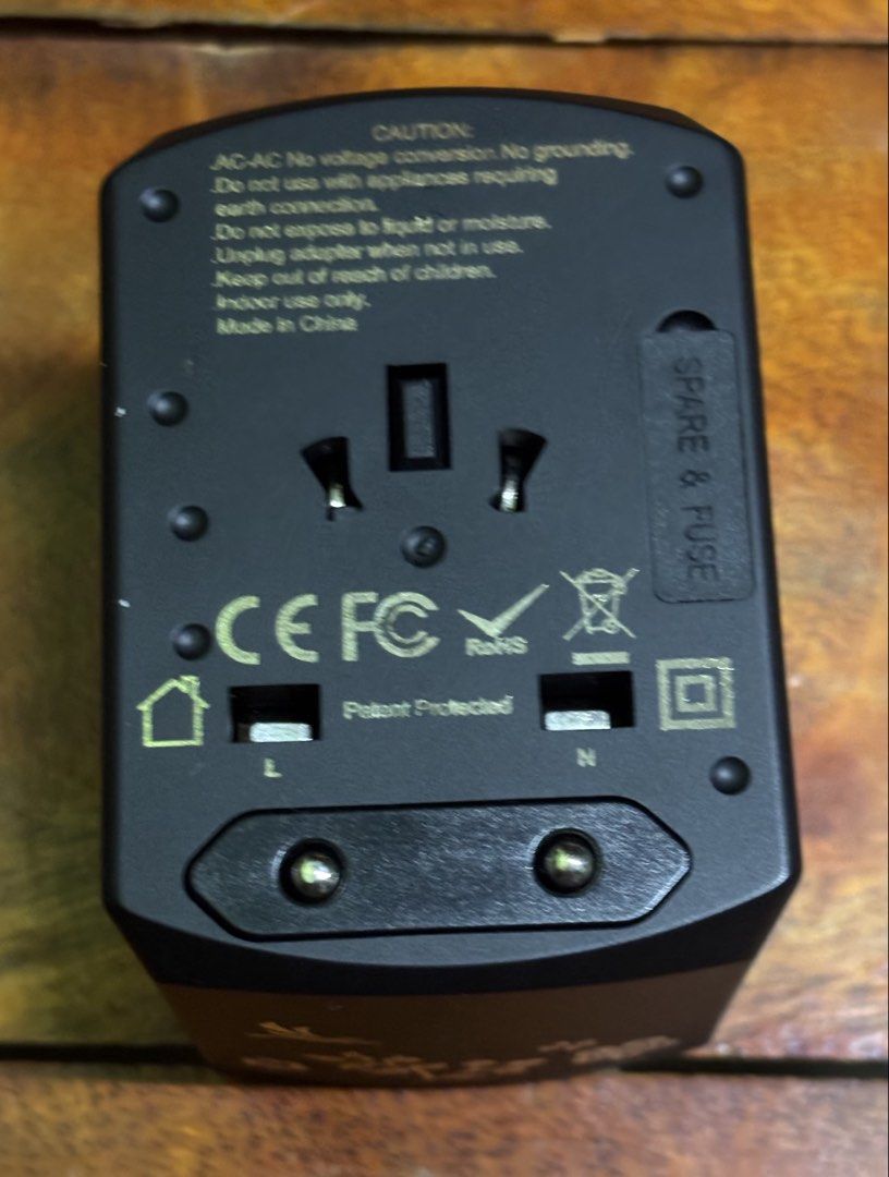 WYNN universal travel adapter (Category: Chargers & Cables) located in Santo Domingo. Submitted by royal.teresa (Listing ID 1462176564, Image 3). Description: -reliable compact all in one international travel adapter -works in over 150+countries -4 smart USB ports -single block covers all your charging needs without needing to carry a separate wall plugs.