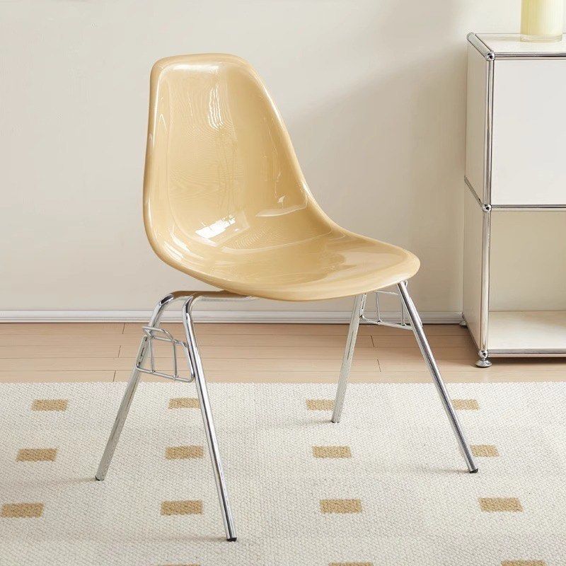 Yellow chair (Category: Chairs) located in Manila. Submitted by shopelisse (Listing ID 1462055980, Image 1). Description: - Cream-colored molded plastic chair - Sleek chrome legs - Versatile: Great for dining tables or as an accent chair - Comfortable and stylish design - Easy to clean surface - Fits modern or retro-themed spaces.