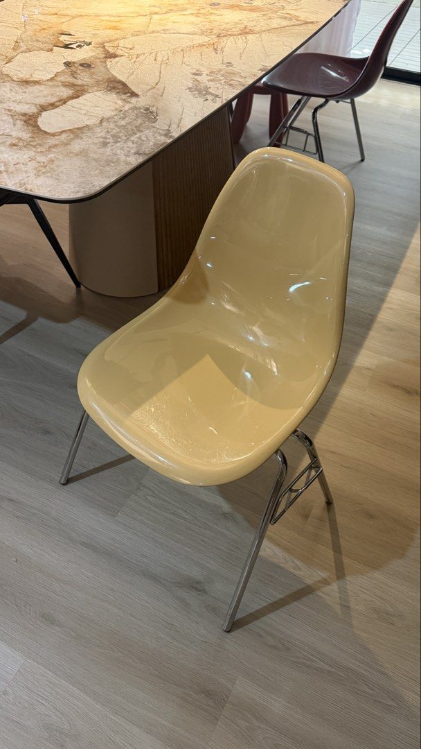 Yellow chair (Category: Chairs) located in Manila. Submitted by shopelisse (Listing ID 1462055980, Image 2). Description: - Cream-colored molded plastic chair - Sleek chrome legs - Versatile: Great for dining tables or as an accent chair - Comfortable and stylish design - Easy to clean surface - Fits modern or retro-themed spaces.