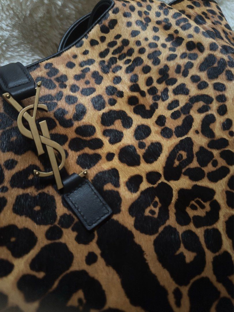 YSL Tote Bag (Category: Luxury Bags & Wallets) located in Quezon City. Submitted by kingwolf824 (Listing ID 1457790584, Image 2). Description: Flash sale today only! YSL bea tote bag in this beautiful pony hair leopard print. Coded, comes with dustbag only. No returns, No exchange, No refunds..