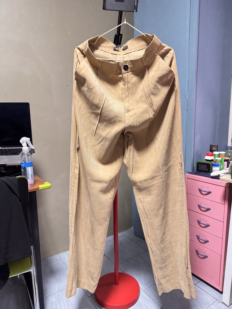 ZARA Beige Pleated Trousers (Category: Other Bottoms) located in Quezon. Submitted by thriftream (Listing ID 1462214532, Image 2). Description: - Zara Beige Corduroy Pants - Never been used - High-waisted with front pleats - Wide leg style - Size: US M / MEX 28 - Waist measurement: Approx. 14 inches across - Perfect for casual or dressed-up looks - Cut out tags but no other issue .
