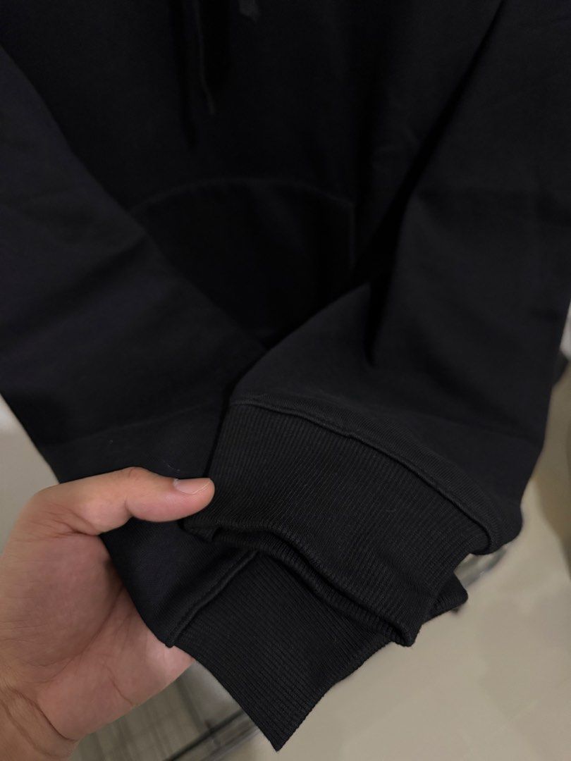 ZARA Black Hoodie Size L (Category: Hoodies) located in Mandaluyong City. Submitted by thewanderingmangyan (Listing ID 1462140464, Image 3). Description: - Classic black ZARA hoodie - Size: Large (L) - Features: Front pocket, adjustable drawstring hood - Comfort: Ribbed cuffs and hem - Origin: Made in Pakistan - Style: Great for casual wear or layering.